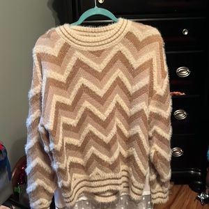 Beautiful V ery j sweater. Loose  fit.